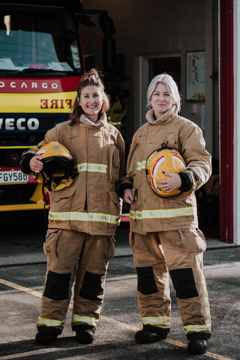 Two female volunteer firefighters