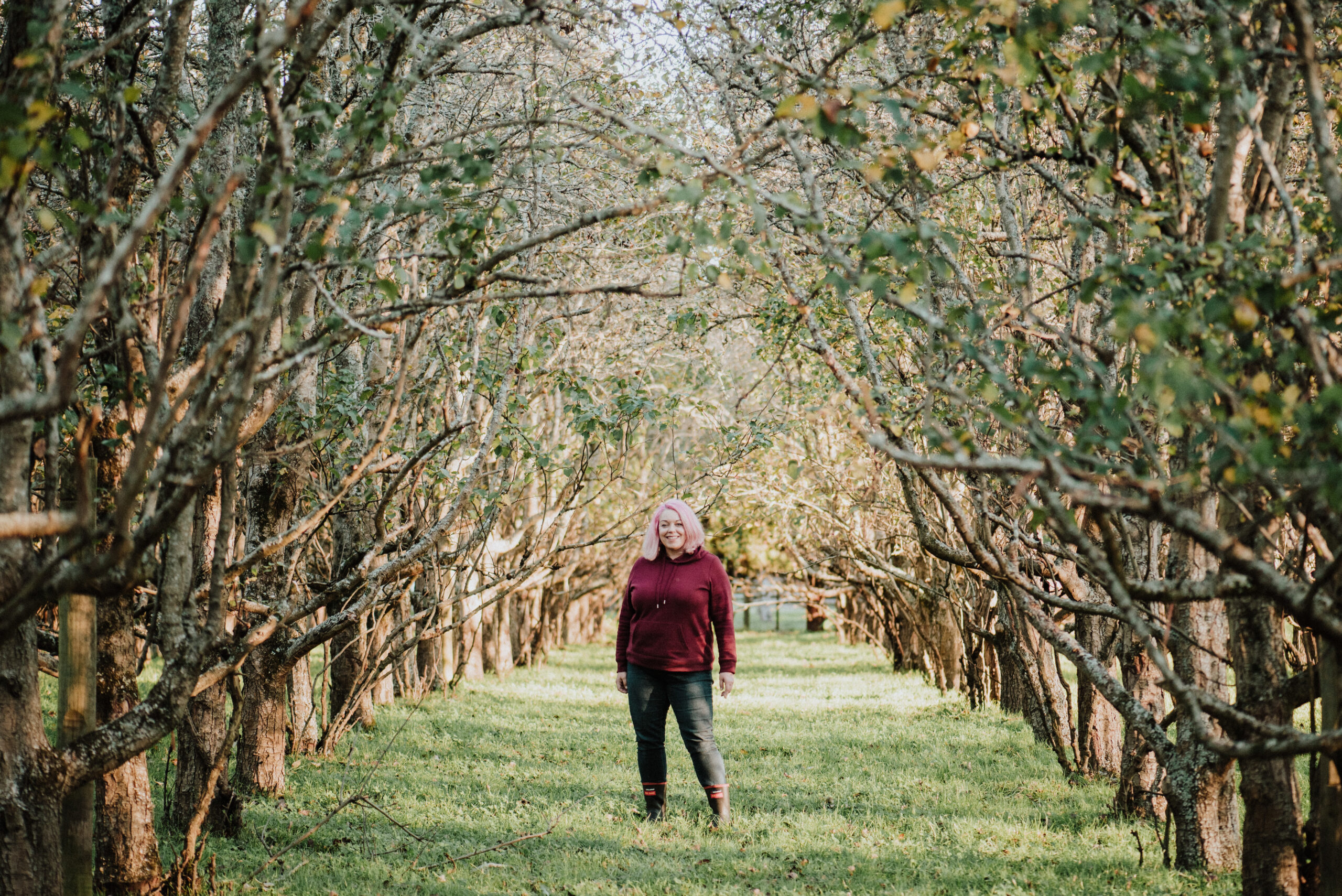 Nikki in her pear orchard